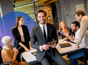A diverse group of people discussing around a table to represent office administrator NQF 5 qualification will be beneficial to office administrators, executive assistants and office managers